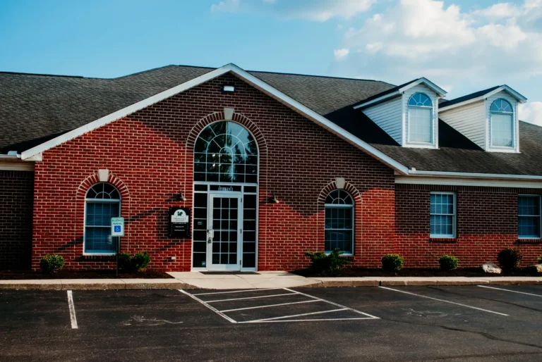 Brick exterior and front entrance of Belden Village Chiropractic and Wellness Center, Suite B, on Munson Street NW in Canton, OH